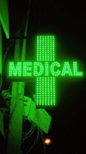 green medical plus sign