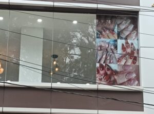Reverse vinyl print for glass
